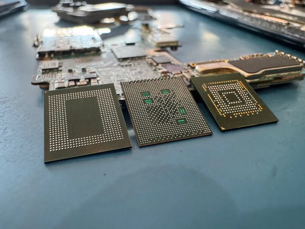 Memory chips on a circuit board under inspection in the MDrepairs data recovery lab